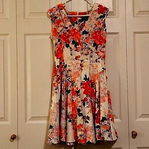 Beautiful bright, slightly flared dress Wore one time for a bridal shower.
